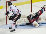 Portland's Oliver Bjorkstrand scores against Kelowna goalie Jordan Cooke in the Winterhawks' 5-1 victory.