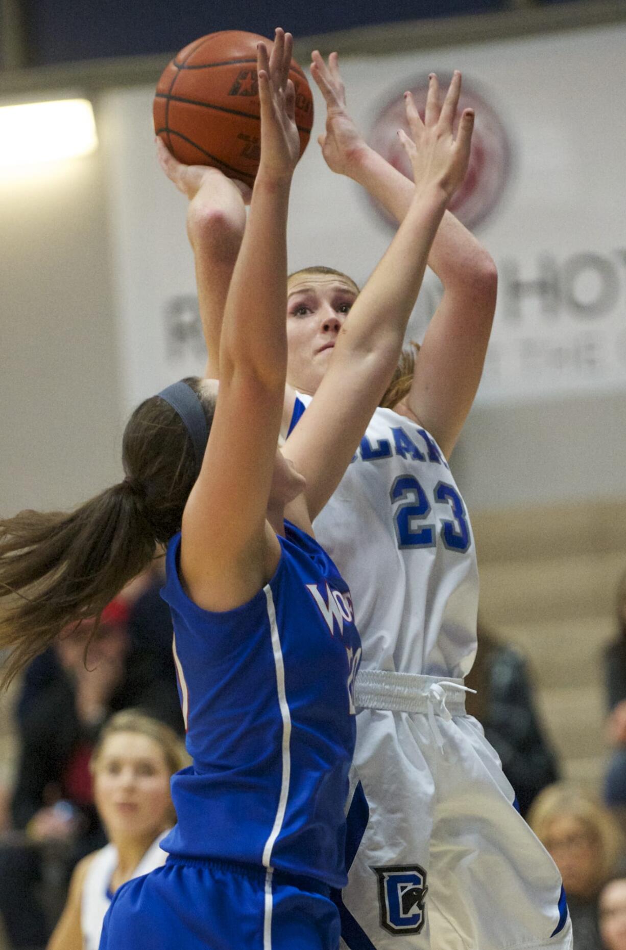 Clark College's Brooke Bowen shoots against Blue Mountain Community College in the championship game of the 2013 Women's Basketball Crossover Tournament at Clark College, Sunday, December 22, 2013. Clark won 77-72.