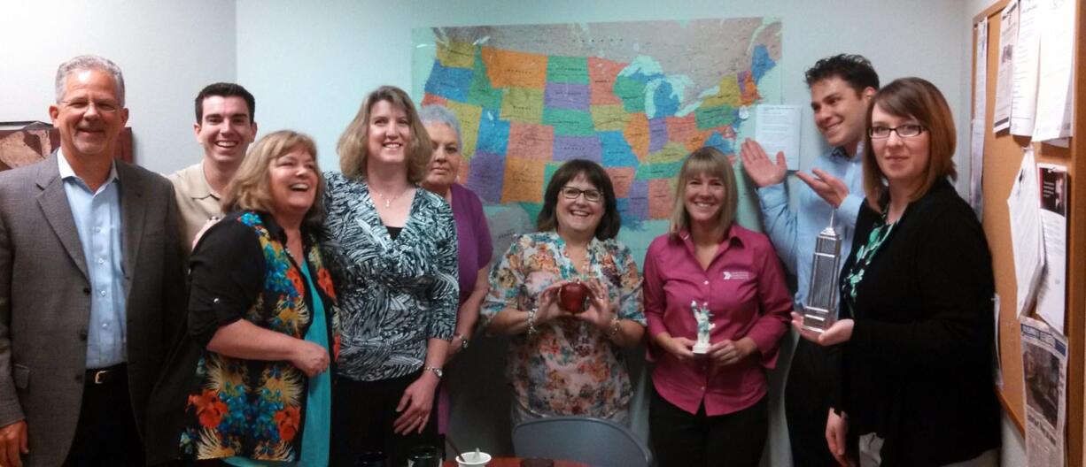 Columbia Way: During a recent employee wellness program, the staff of Davidson and Associates Insurance in Vancouver used pedometers to track how far they walked, marking their virtual journey from here to New York on a map in their office.