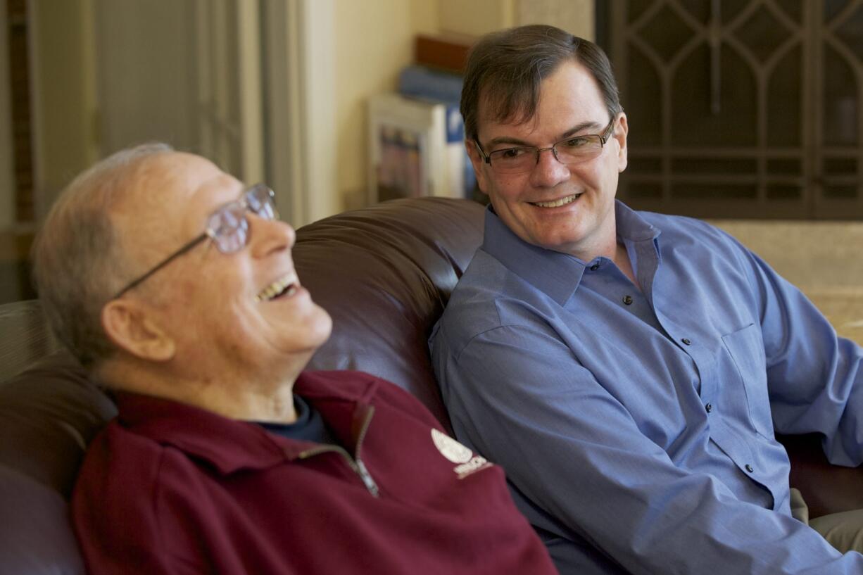 Dick Malin, left, collapsed from cardiac arrest while exercising at Marshall Community Center on Jan. 2.