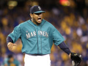 Seattle Mariners starting pitcher Felix Hernandez yells after the final out of the eighth inning against the Houston Astros on Friday. Hernandez left at the end of that inning, after fielding a grounder from Dexter Fowler to start a double play.