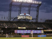 Houston Astros starting pitcher Collin McHugh begins his windup in the second inning against the Seattle Mariners, Tuesday in Seattle.