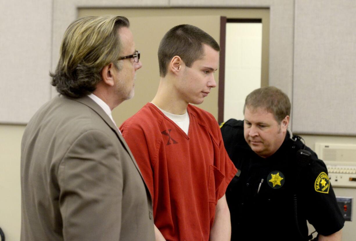 Colton Harris-Moore, center, nicknamed the Barefoot Bandit.