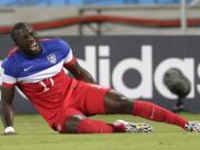 United States' Jozy Altidore grimaces after pulling up injured during the group G World Cup soccer match between Ghana and the United States at the Arena das Dunas in Natal, Brazil, Monday.