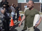 Former Montreal, Maine and Atlantic Railway Ltd. employee Thomas Harding leaves court today after being granted bail in Lac-Megantic, Quebec.