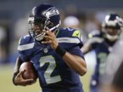 Seattle Seahawks quarterback Terrelle Pryor runs 44 yards for a touchdown against the San Diego Chargers in the second half of last week's preseason game in Seattle.