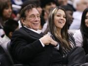 Los Angeles Clippers owner Donald Sterling attends an NBA basketball game.