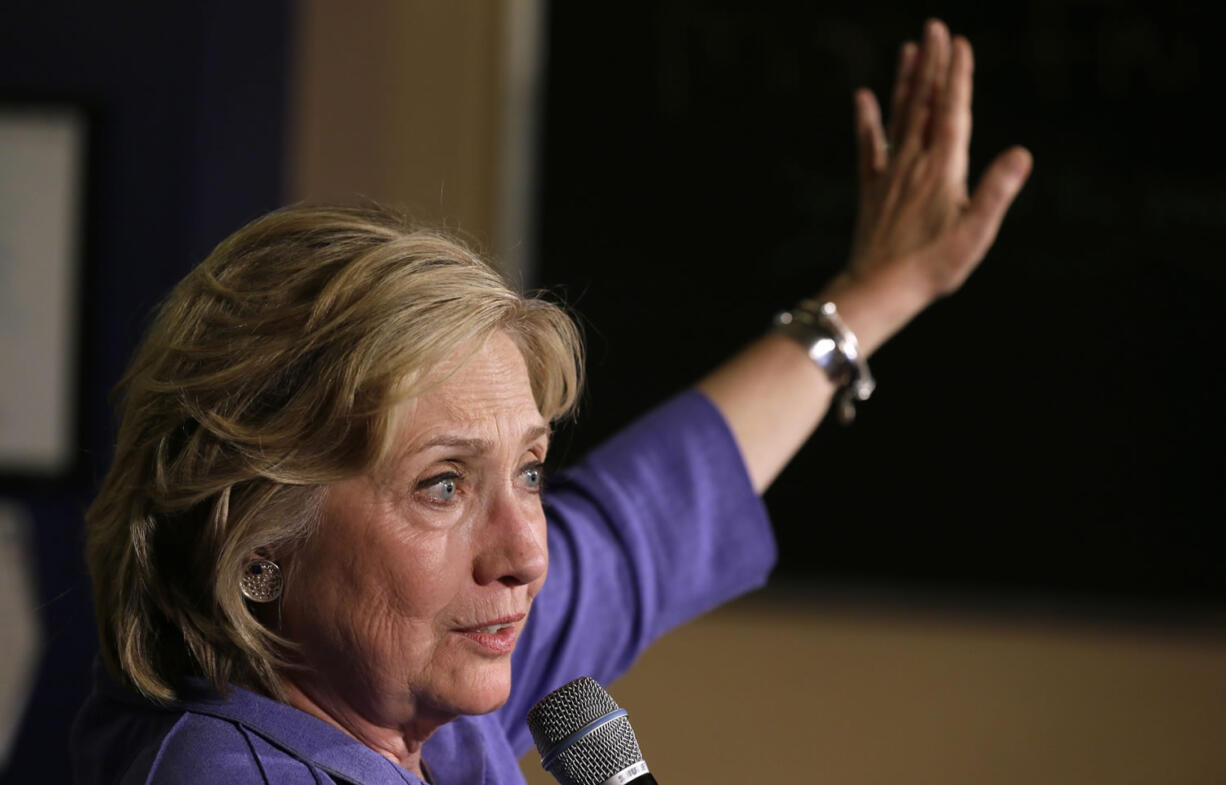 Democratic presidential candidate Hillary Rodham Clinton speaks during a campaign stop at Uncle Nancy's Coffee House in Newton, Iowa. After spending the first few months of her campaign bemoaning &quot;secret, unaccountable money&quot; in politics, Clinton is coming out Tuesday, Sept. 8, with proposals to roll back the effects of the landmark Supreme Court case governing campaign finance won by conservative activist group Citizens United.