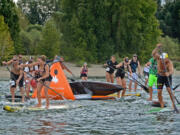 The start and turn 1 of the 8 mile race. Fiona Wylde, front, was the top female finisher.