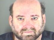 Darrel Dwight, a substitute teacher at Evergreen Public Schools and Boy Scouts leader, in a mugshot provided Dec.