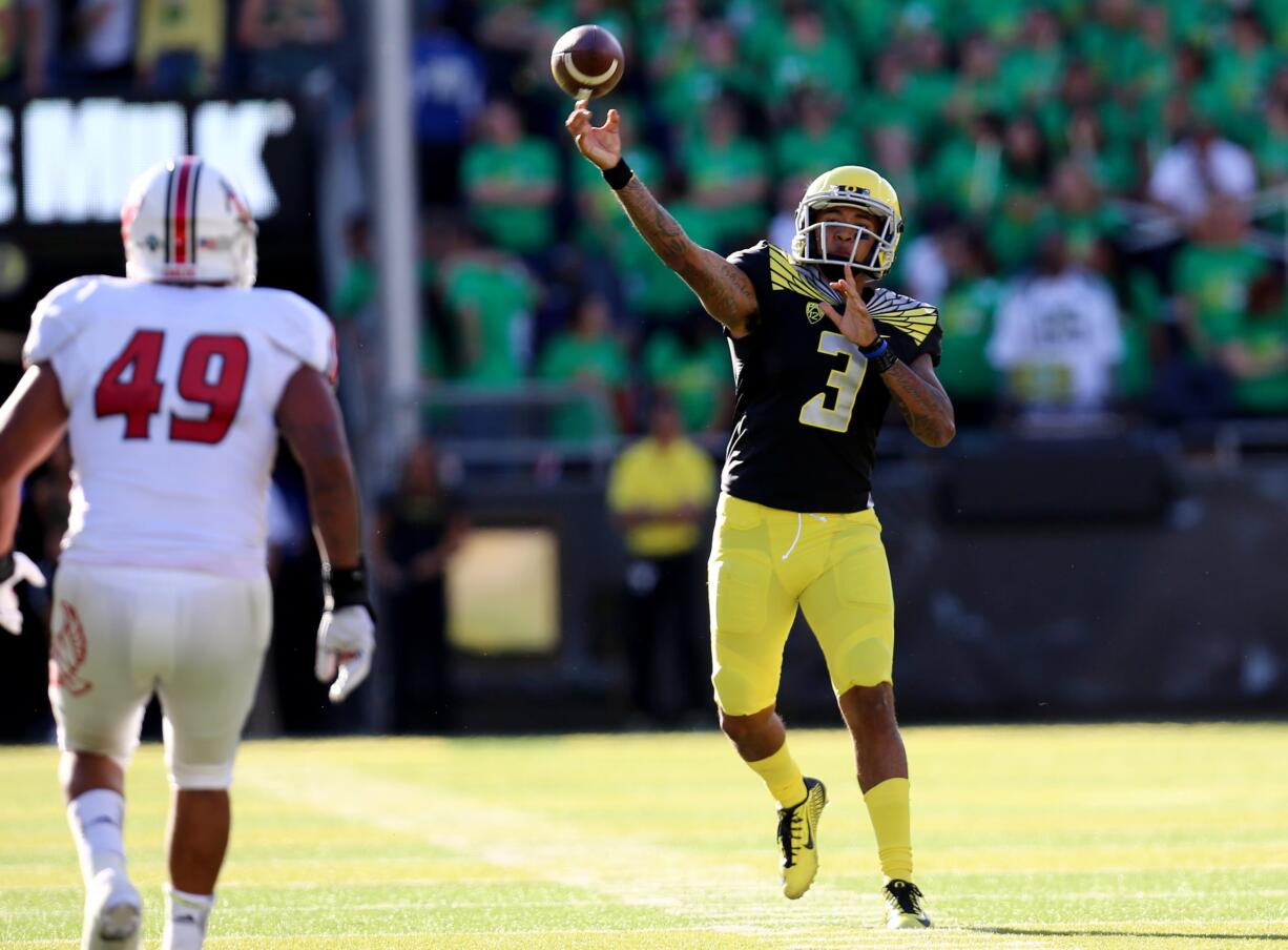 Oregon quarterback Vernon Adams Jr. (3) throws the football during the second quarter of an NCAA college football game against Eastern Washington Saturday, Sept. 5, 2015, in Eugene, Ore.