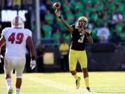 Oregon quarterback Vernon Adams Jr. (3) throws the football during the second quarter of an NCAA college football game against Eastern Washington Saturday, Sept. 5, 2015, in Eugene, Ore.