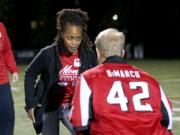 Deanna Kathumbi-Jackson was one of 176 mothers who attended a youth football safety clinic hosted by the Atlanta Falcons on Tuesday.