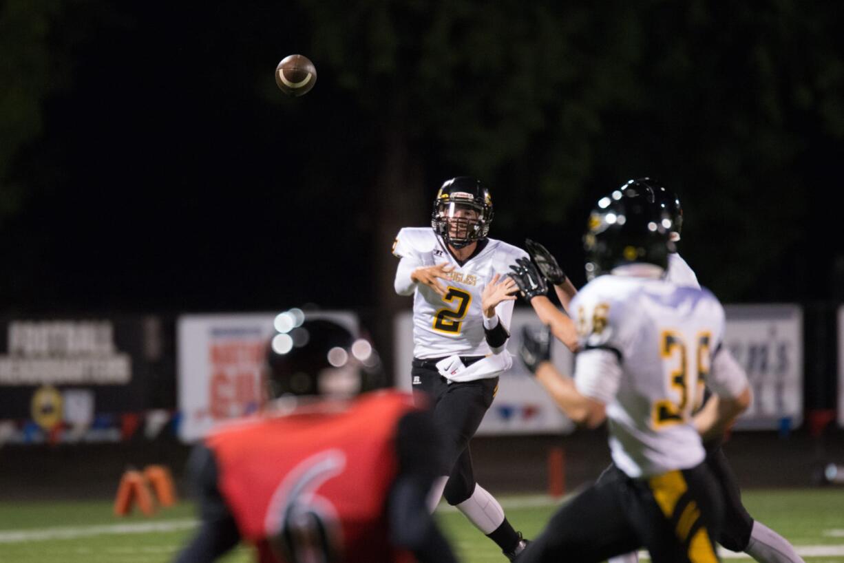 Hudson's Bay quarterback Jordan Hickman (2) makes the open pass against Fort Vancouver on Sept. 4, 2015, at Kiggins Bowl.