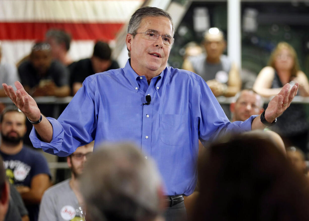 Republican presidential candidate former Florida Gov. Jeb Bush speaks to employees at Foss Manufacturing during campaign stop in Hampton, N.H.