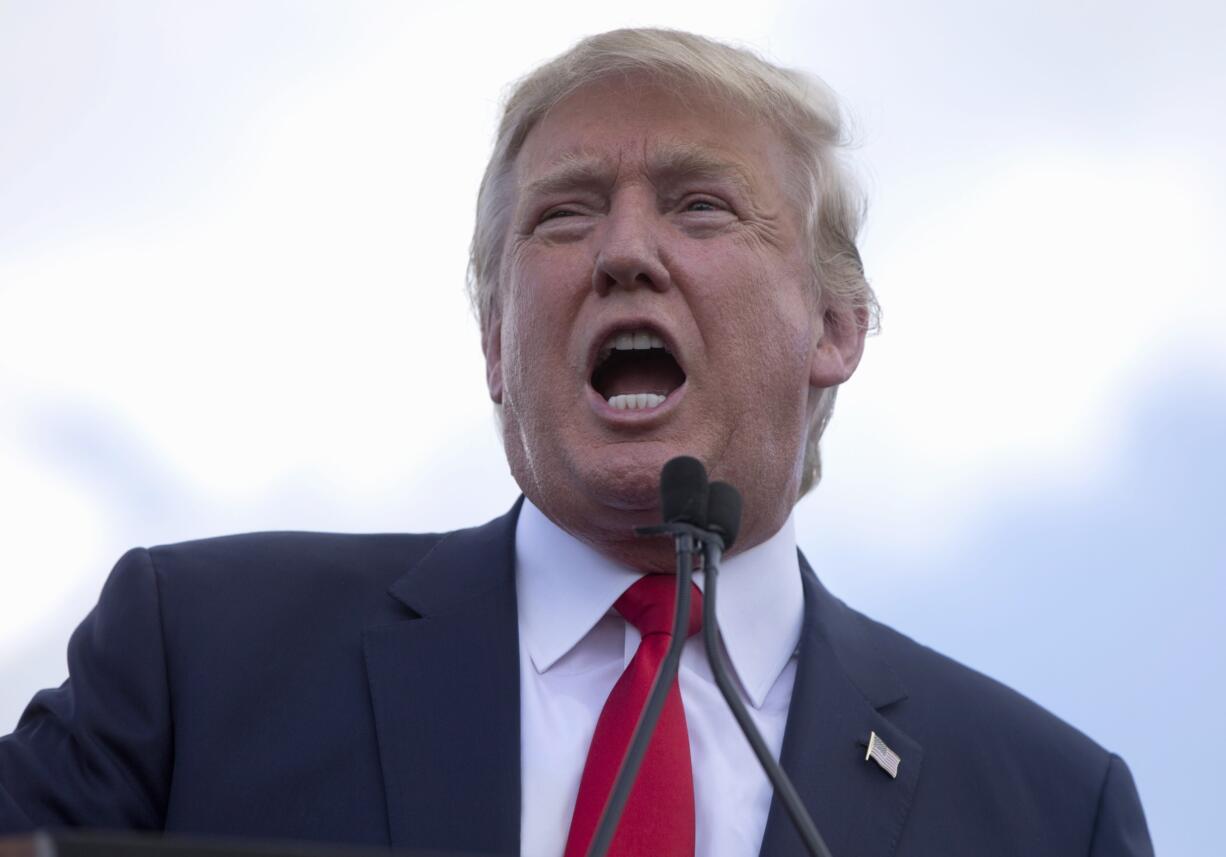 Republican presidential candidate Donald Trump speaks on Capitol Hill in Washington.