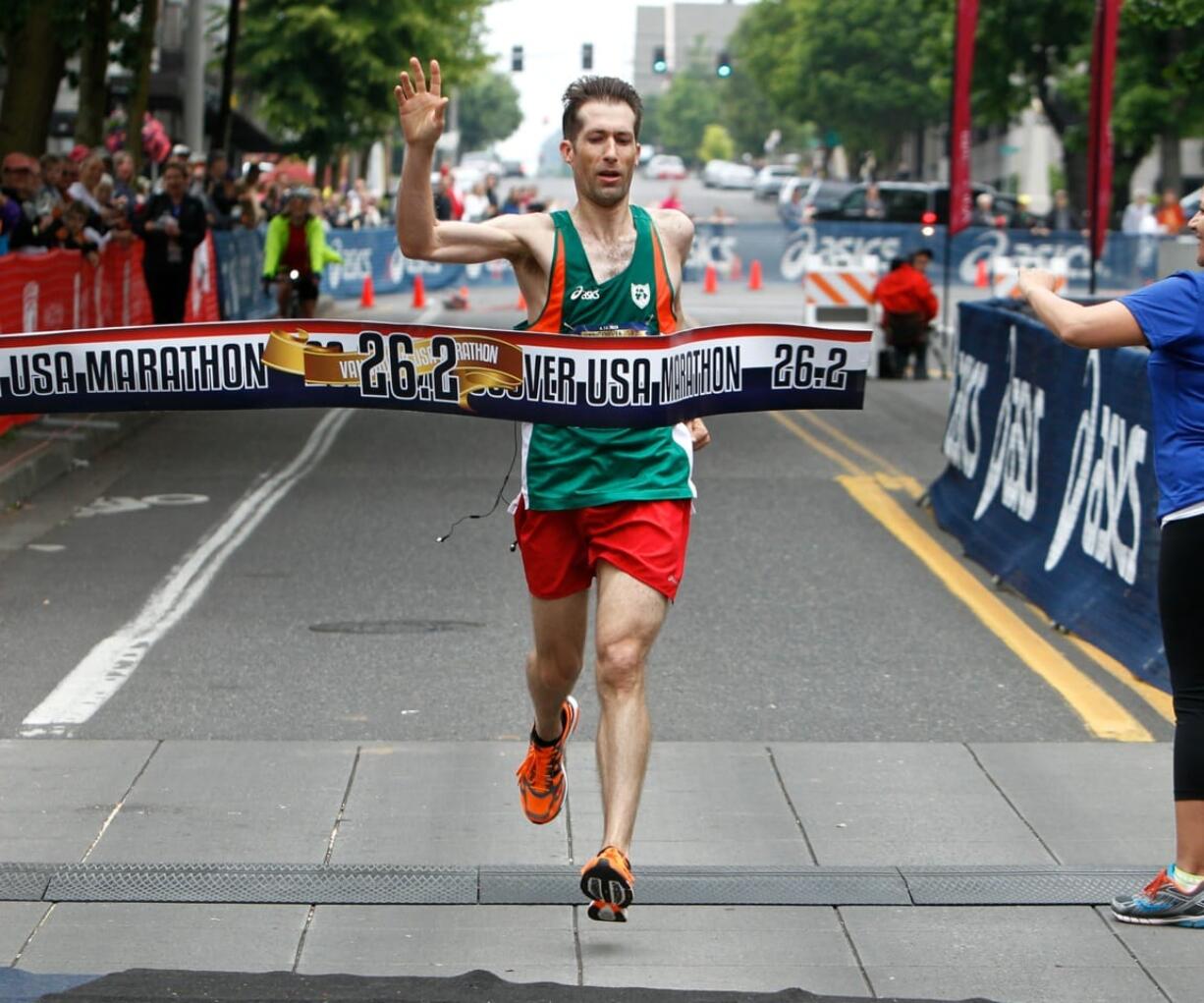 Roseburg, Ore., native Wynston Alberts of Tokyo wins Vancouver USA Marathon in just over 2:30 on Sunday in downtown Vancouver.