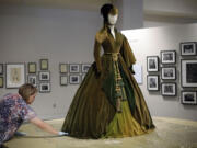 Eric Gay/Associated Press
Conservator Mary Baughman prepares the green curtain dress from the movie &quot;Gone with the Wind&quot; for display at the University of Texas in Austin, Texas.