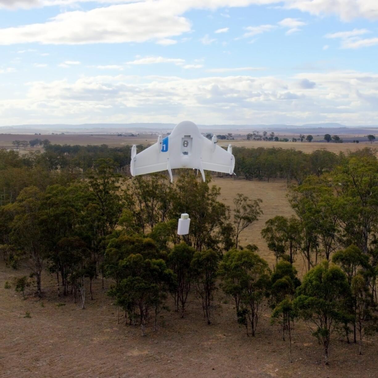 Google
A Project Wing drone flies during delivery. Google's secretive research laboratory is trying to build a fleet of drones designed to bypass earthbound traffic so packages can be delivered to people more quickly.