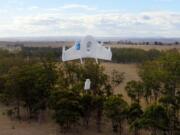 Google
A Project Wing drone flies during delivery. Google's secretive research laboratory is trying to build a fleet of drones designed to bypass earthbound traffic so packages can be delivered to people more quickly.