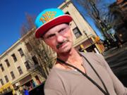 Former heroin addict David Fitzgerald stands near the rehabilitation clinic where he works as the leader of the mentor program in Portland.