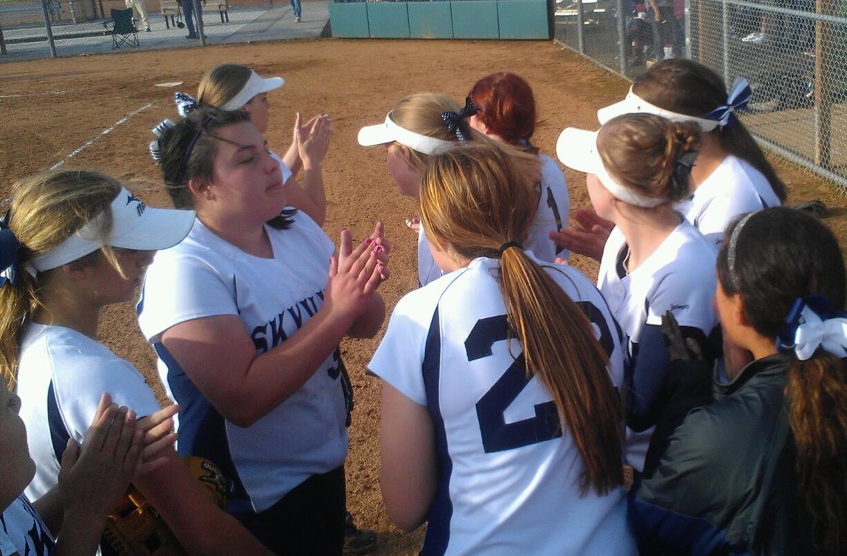 Skyview softball players celebrate their 5-1 win over Mountain View on Friday.