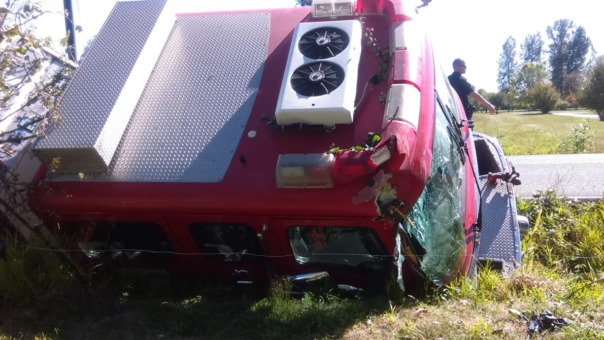 A Clark County Fire & Rescue truck, pictured here, was on its way back to the station following a trip to the mechanic when it drove into ditch and power pole Thursday afternoon near Battle Ground. No one was hurt.