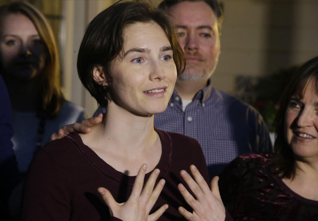 Amanda Knox talks to members of the media outside her mother's home in Seattle in March. Italy's top criminal court has scathingly faulted prosecutors for presenting a flawed and hastily constructed case against Amanda Knox and her former Italian boyfriend, saying Monday, Sept. 7, 2015 it threw out their convictions for the 2007 murder of her British roommate in part because there was no proof they were in the bedroom where the woman was fatally stabbed. (AP Photo/Ted S.