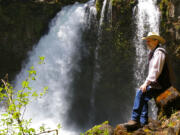 Bill Richardson of the Rocky Mountain Elk Foundation takes a break at Kalama Falls in eastern Cowlitz County.