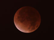 A  lunar eclipse is visible in Puget Sound in 2011.