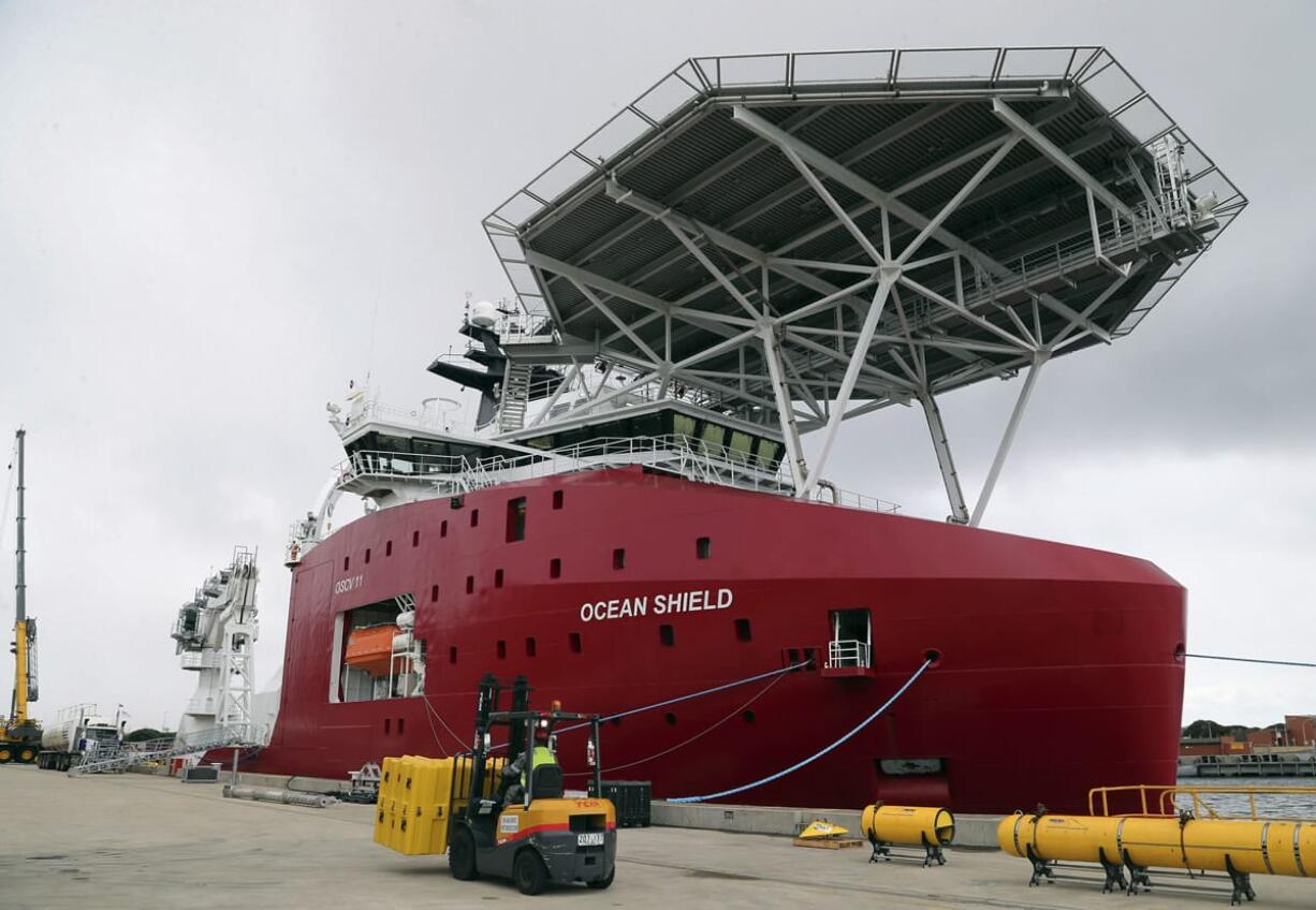 Australian Defense ship Ocean Shield is docked at naval base HMAS Stirling while being fitted with an autonomous underwater vehicle and towed pinger locator to aid in the search for missing Malaysia Airlines Flight MH370, in Perth, Australia.