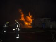 Fire officials said that candles likely ignited a fire at a duplex in Vancouver's Bagley Downs neighborhood early this morning, displacing two residents.