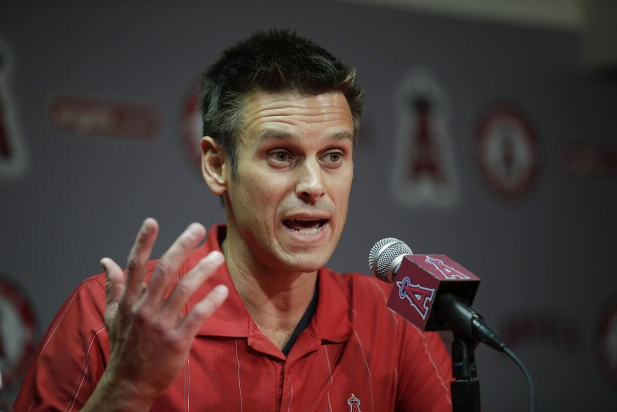 Los Angeles Angels General Manager Jerry Dipoto speaks to reporters during a news conference in April. The Seattle Mariners have found their new general manager, hiring former Angels GM Jerry Dipoto. Seattle announced Dipoto's hiring Monday, Sept. 28, 2015. He replaces Jack Zduriencik, who was fired in late August after seven disappointing seasons. (AP Photo/Jae C.