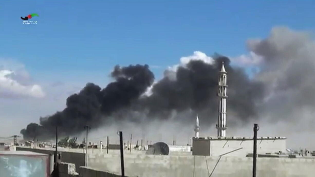 In this image from video, smoke rises after airstrikes by military jets in Talbiseh of the Homs province, western Syria, on Wednesday. Russian military jets carried out airstrikes in Syria for the first time on Wednesday, targeting what Moscow said were Islamic State positions. U.S. officials and others cast doubt on that claim, saying the Russians appeared to be attacking opposition groups fighting Syrian government forces.