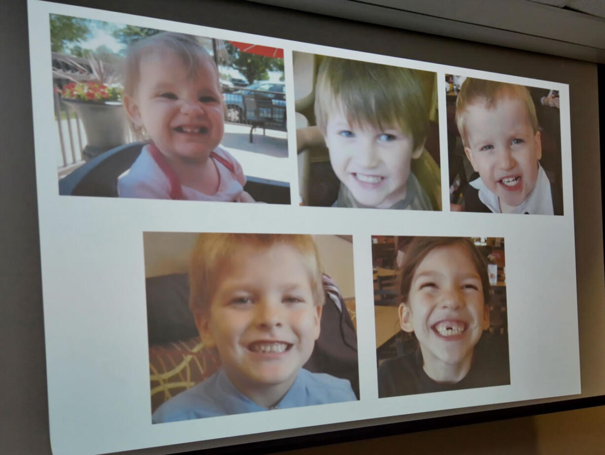 Photos of Timothy Ray Jones Jr. children are on display during a news conference at the Lexington County Sheriff's Dept Training Center in Lexington, S.C., Wednesday, Sept. 10, 2014.  Jones Jr., 32, will be charged with murder in the deaths of his five children after he led authorities to a secluded clearing in Alabama, where their bodies were found wrapped in garbage bags, a sheriff said Wednesday.