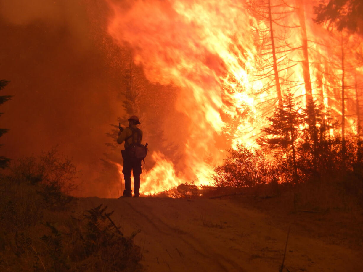 The Cougar Creek Fire on Mount Adams has burned more than 53,000 acres on three sides of the peak in the past three weeks.