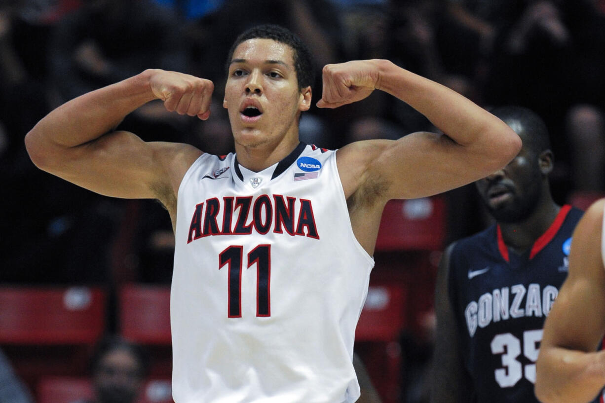 Arizona forward Aaron Gordon reacts after scoring a basket while playing Gonzaga during the first half of a third-round game in the NCAA college basketball tournament, Sunday, March 23, 2014, in San Diego.