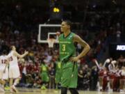 Oregon guard Joseph Young (3) reacts during the second half of a third-round game against the Wisconsin in the NCAA college basketball tournament Saturday, March 22, 2014, in Milwaukee. Wisconsin won 82-77.