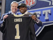 Oregon State wide receiver Brandon Cooks poses with NFL commissioner Roger Goodell after being selected by the New Orleans Saints as the 20th pick the first round of the 2014 NFL Draft, Thursday.