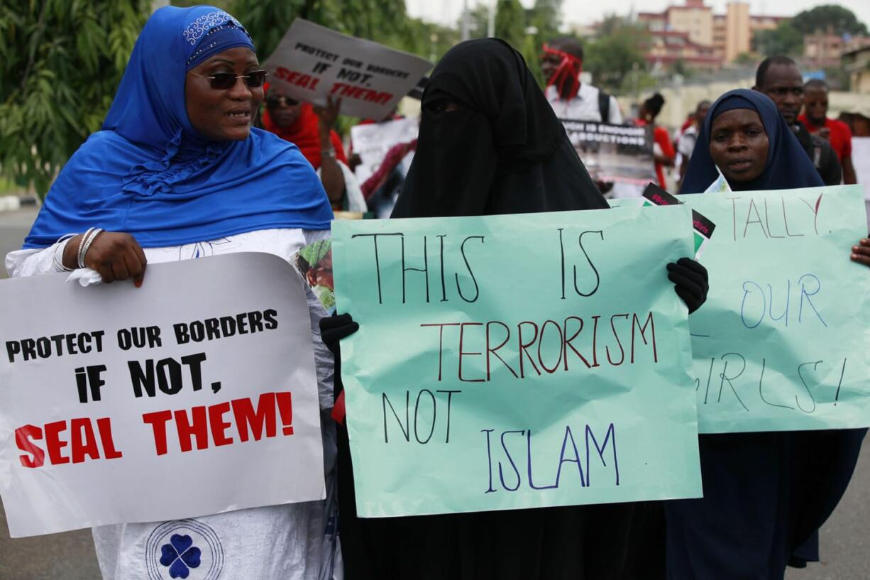 Muslim women attend a demonstration calling on the government to increase efforts to rescue the 276 missing kidnapped school girls of a government secondary school Chibok, in Lagos, Nigeria, on Monday.