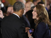 President Barack Obama talks today with Rep. Jaime Herrera Beutler, R-Camas, in the East Room of the White House in Washington after a ceremony where the president honored the NFL Super Bowl champion Seattle Seahawks football team.