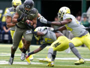 Thomas Tyner had 58 yards rushing and 26 yards receiving in Oregon's spring game, including a touchdown catch.