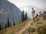 Hikers rest on Easy Pass in Washington's North Cascades near Marblemount.