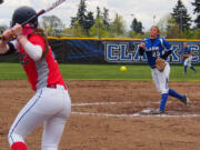 Clark College pitcher Katelyn Lukes delivers to Clackamas batter Cassidy Edwards during the first game of a doubleheader Wednesday, April 8, 2015.