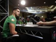 Oregon quarterback Marcus Mariota talks to reporters during the team's media day Monday, Dec. 29, 2014, in Los Angeles. Oregon is scheduled to play Florida State in the Rose Bowl NCAA college football playoff semifinal on New Year's Day. (AP Photo/Jae C.