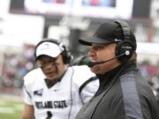 Portland State head coach Bruce Barnum, right, watches during the first half of an NCAA college football game against Washington State, Saturday, Sept. 5, 2015, in Pullman, Wash.