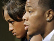 Janay Rice, left, listens as her husband, Baltimore Ravens running back Ray Rice, speaks to the media during a news conference in Owings Mills, Md., on May 23.