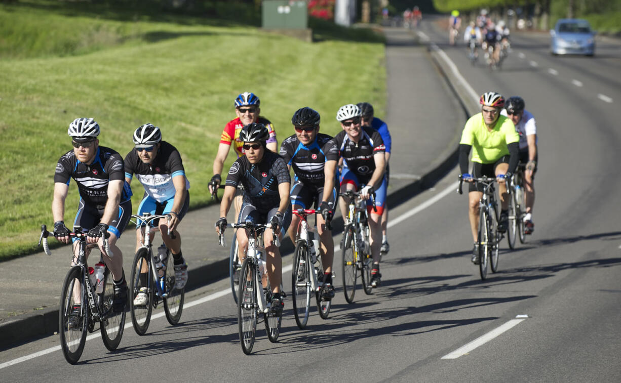 Cyclists make their way toward Lacamas Lake during the Vancouver Bicycle Club's Ride Around Clark County.