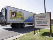 A truck enters the Foster Farms processing plant in Livingston, Calif.