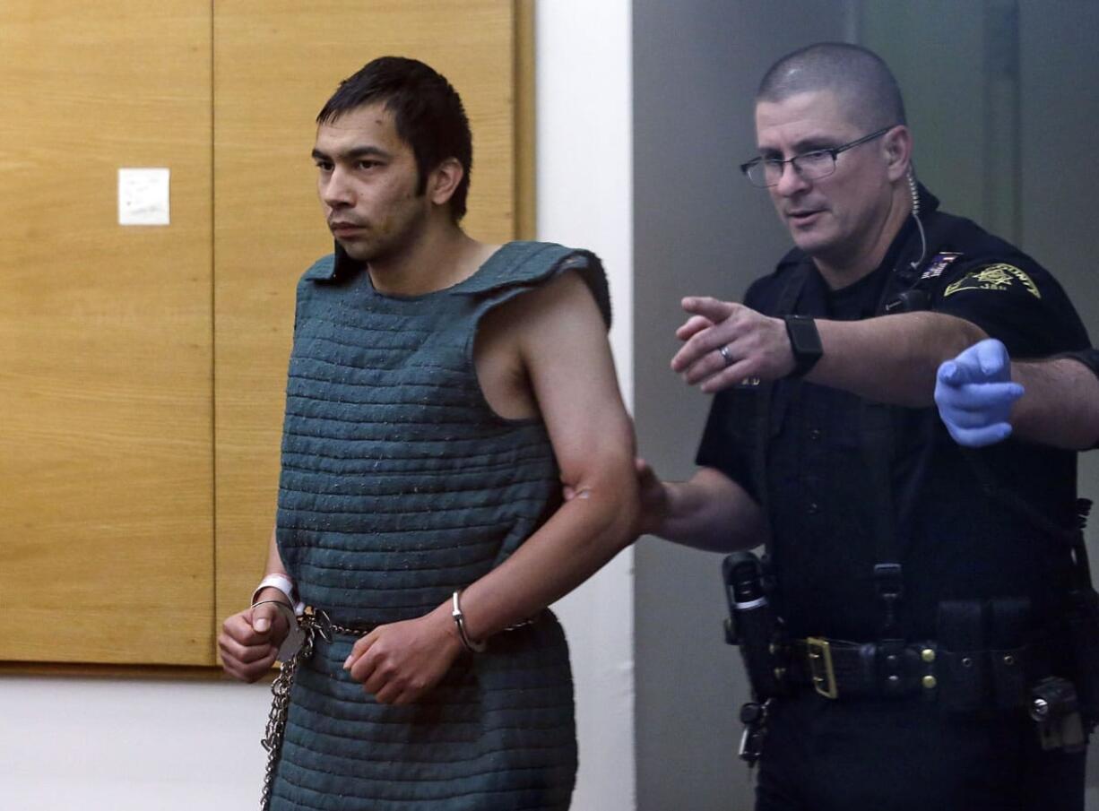 Seattle Pacific University shooting suspect Aaron Rey Ybarra is led into court Friday in Seattle.